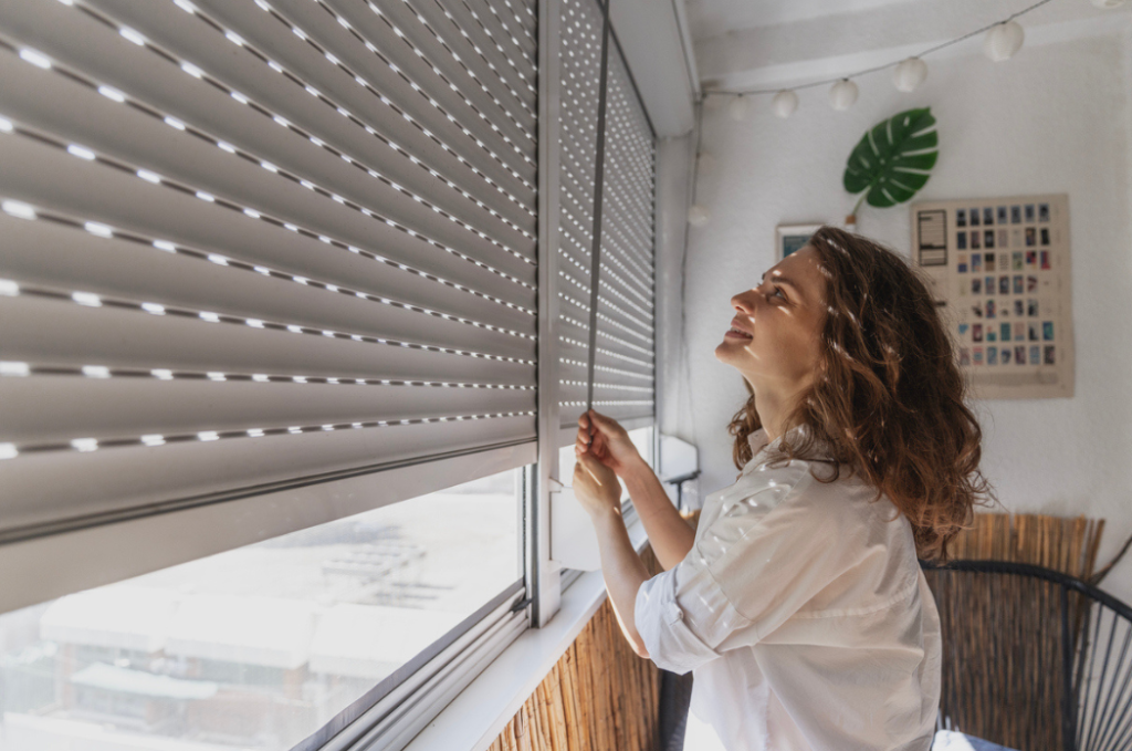 a woman looking out a window